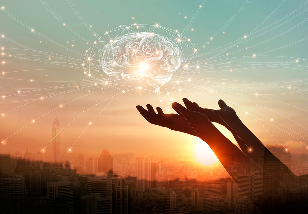 concept of brain health. hands holding brain image in sky.